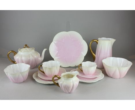 A Foley china pink tinted part tea set of cups, saucers, teapot, jug, etc