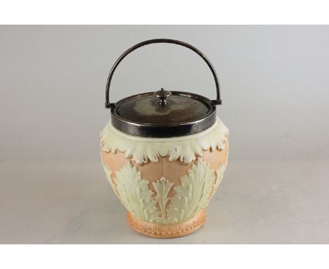 A Worcester Locke and Co porcelain biscuit barrel, pink glazed, moulded with acanthus leaves, 16cm