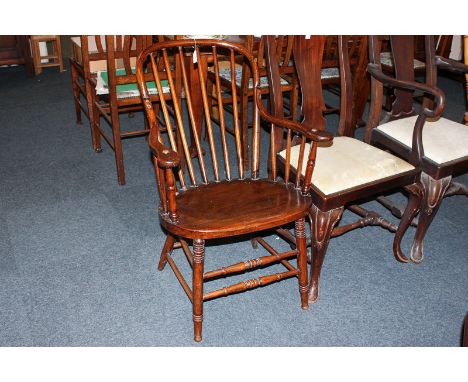 A stick back 'Windsor' elbow chair with wooden seat