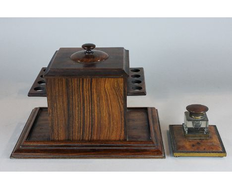 A rosewood pipe rack and tobacco box together with a 'tortoiseshell' desk inkwell