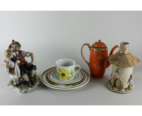 An Italian ornament, granddad and boy, eight other figure ornaments, three cottage candle lights, Japanese part coffee set an