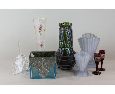 An Art Deco frosted glass vase, another smaller, a floral decorated glass vase in enamels, an early 20th century iridescent c