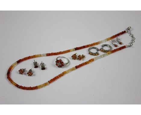 A collection of Mexican fire opal jewellery comprising necklace, earrings and a ring