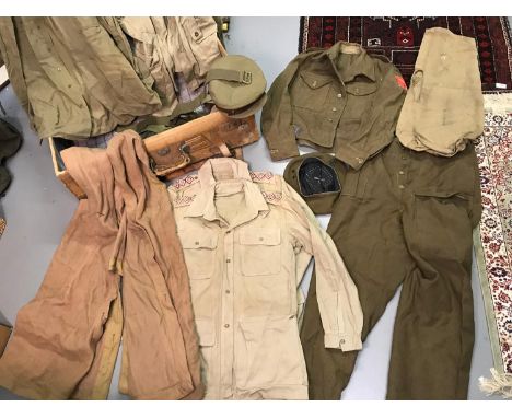 A Vintage suit case containing WW2 Uniform belonging to W.G.MERRIMAN of the Royal Army Medical Corps, Contains shirts, hats, 