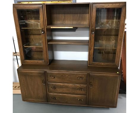 An Elm wood Ercol display Cabinet (Dismantles easily) Measures  164x156x43cm 