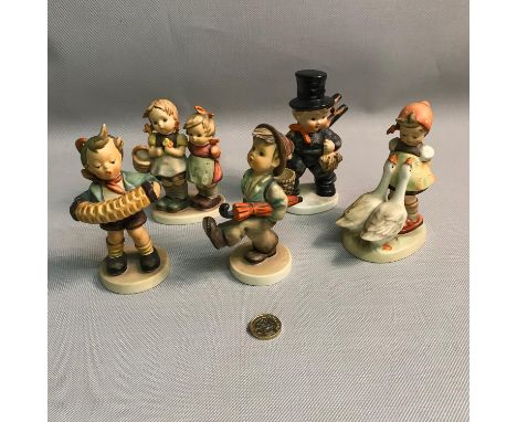 A lot of 5 Goebel Hummel boy and girls figures. (2 damaged) 