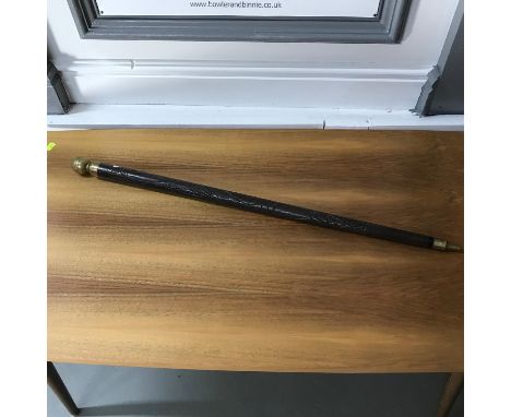 Vintage carved walking stick which converts into a pool cue. 