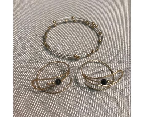 A 9ct gold and white gold bangle together with 9ct gold earrings, Total weight 6.62grams 