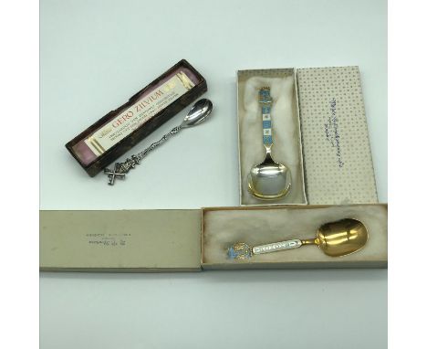 A Lot of two Norwegian silver and enamel spoons with original boxes, together with Molen 990 silver ornate spoon with box. 