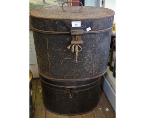 Two vintage metal storage tins.