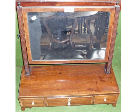 A Victorian inlaid mahogany dressing table mirror having three base drawers.