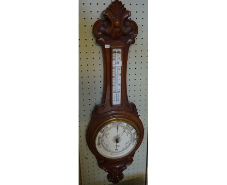 A 19th Century Show wood mahogany aneroid banjo barometer marked J. Winter Stockport. 