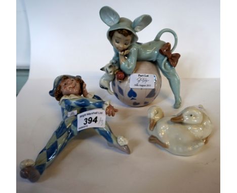 A collection of three Nao and Lladro figures to include a Nao Lladro figure of two ducks, a Lladro figure of a Jester lying d