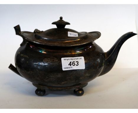 A Sheffield hallmarked silver teapot (missing handle), 20.1oz.