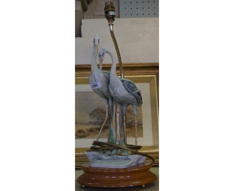 A modern Capodimonte table lamp depicting a pair of storks. 