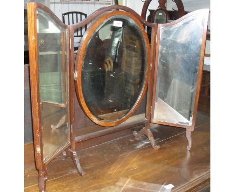 A Victorian mahogany triptych dressing table mirror.