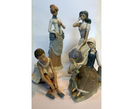 A mixed collection of ceramic items to include a Nao Lladro model of a ballerina, a Lladro figure of a girl with a dove, two 