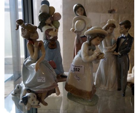 A group of five Lladro and Nao figures to include a Lladro figure of a girl on the telephone with Dalmatian, a Lladro figure 