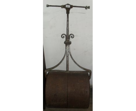 A vintage garden roller.