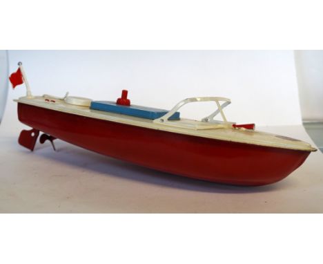 Two Sutcliffe boats, comprising boxed 'Sprite' daycruiser - cream, light green hull in card picture box - clockwork, and an u