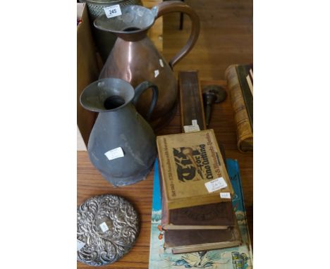 A mixed lot of assorted items to include two copper haystack jugs, vintage bone dominoes, hallmarked silver mirror and posy v