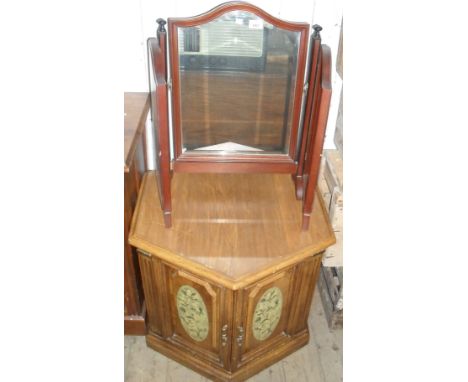 A reproduction mahogany triptych folding mirror, together with an oak effect hexagonal topped TV stand. 