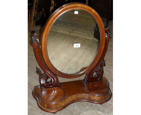 A Victorian mahogany dressing table mirror, having two base drawers.