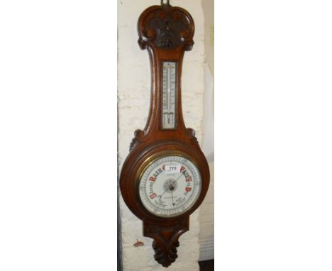 An early 20th Century oak aneroid barometer by Butt & Co of Chester & Wrexham.