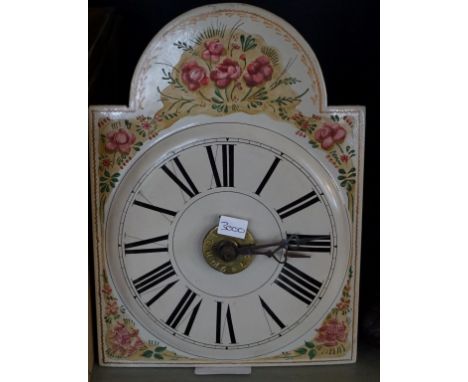 A hand painted Postman's alarm clock.