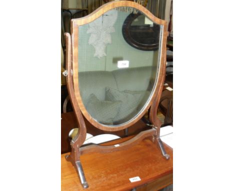 A reproduction mahogany shield shaped dressing table mirror.