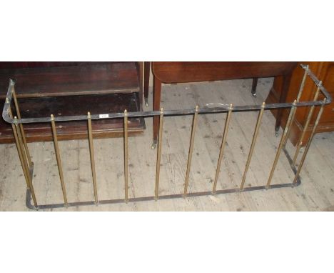 A brass club style fender.