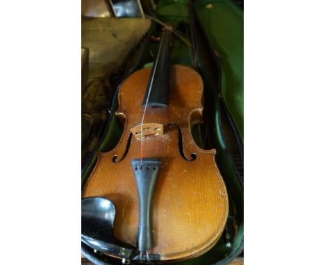 A vintage Stradivarius copy violin with two-piece veneered back.