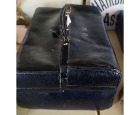 A vintage leather vanity case.