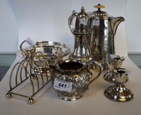 A pair of Birmingham hallmarked silver dwarf candlesticks raised upon step base a silver-plated coffee pot and silver-plated 