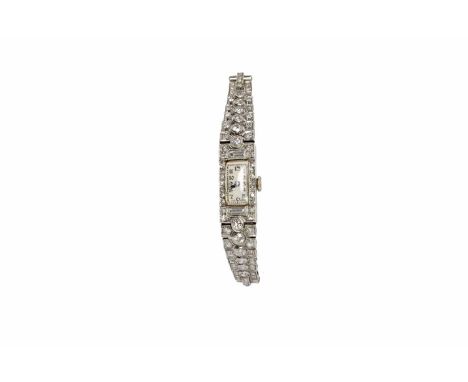 LADY'S FRENCH ART DECO DIAMOND SET MANUAL WIND COCKTAIL WATCHunsinged movement, the rectangular dial with Arabic numerals in 