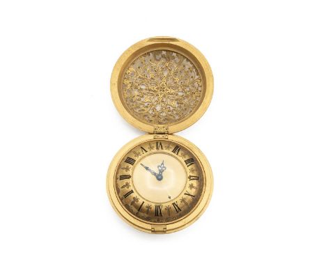 Jaeger Lecoultre travel alarm clock in pierced gilt brass Baroque style case, opening to reveal a gilt brass chapter ring wit