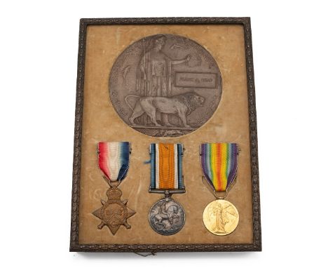 WW1 British medals and death plaque mounted in a Copper frame decorated with Laurel Leaves. Printed letter from the king inse