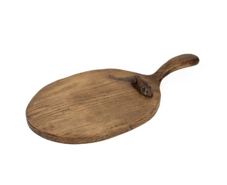 Robert 'Mouseman' Thompson breadboard, c1950s. Carved mouse to board. L 37cm, W 19.5cm, H 4.5cm.