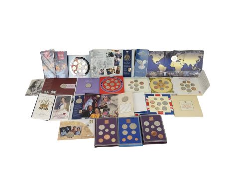 Collection of brilliant uncirculated (BU) UK coins and sets, including annual sets, £2 coins and £5 coins in original sleeves