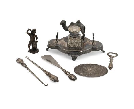 Silver-plated desk stand, along with silver dressing table items, the desk stand with a single glass well and a figure of a c
