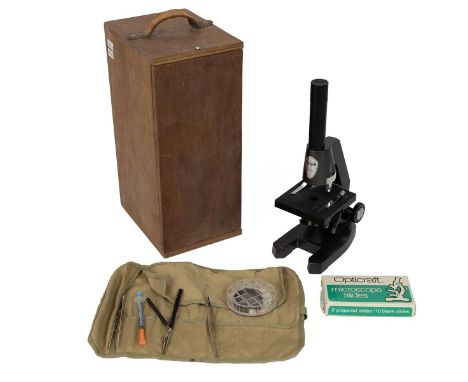A vintage Swift Tecnar scientific microscope single eyepiece in the original case, with accessories.