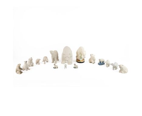 Collection of 16 ceramic polar bears - no makers marks - largest H 17cm, L 40cm. (16)