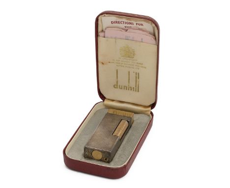 Mid-century textured Dunhill lighter, with original box and paperwork.