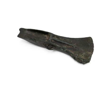 Bronze Age socketed and looped 'Palstave' axe head, circa 1,500 - 1,300 BCE , with central rib. L 15cm, weight 400 grams.