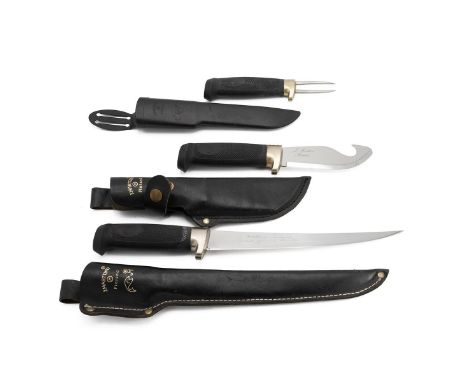Three Finnish Marttiini fishing/hunting knives, each with a leather scabbard.