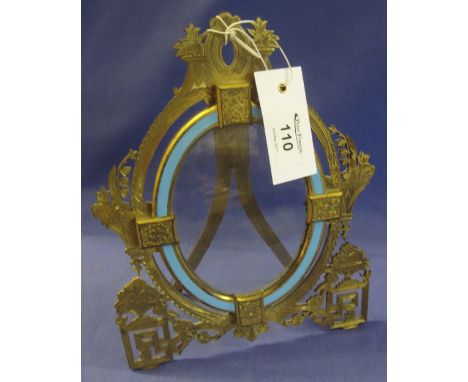 Victorian enamelled Ormolu photograph frame with blue enamel band and stand.  Lacks back.(B.P. 24% incl. VAT)