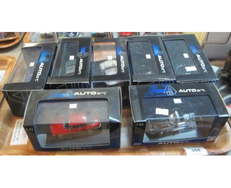 Tray of seven Autoart detailed scale model vehicles in original packaging and perspex cases. (7)(B.P. 24% incl. VAT)