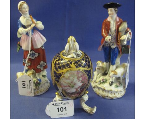 Pair of Continental porcelain figures, a country couple in 18th Century dress, gold anchor marks.  Together with a Continenta