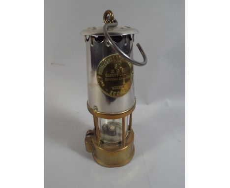 A Miners Lamp by The Protector Lamp and Lighting Company.