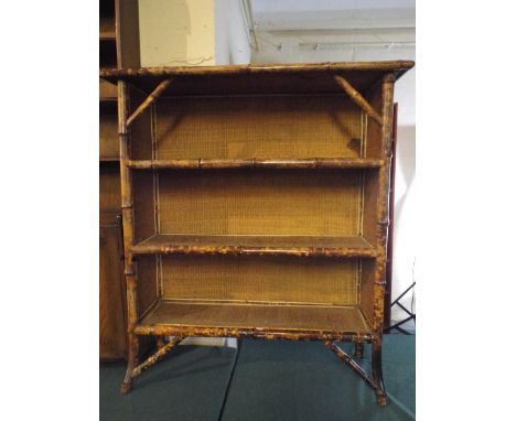 A Bamboo Three Shelf Open Bookcase.